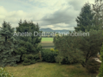 Blick - Mehrfamilienhaus mit Scheune und Garagen