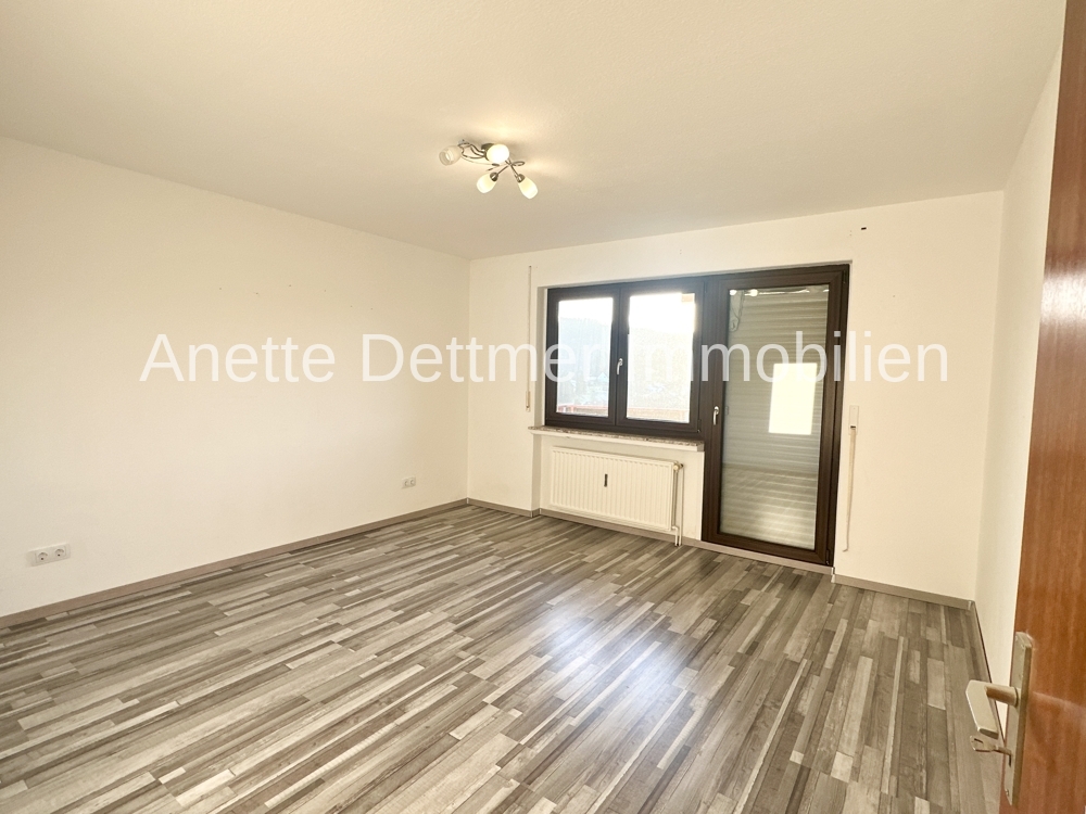 10 EG Schlafzimmer mit Zugang zum Balkon