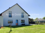 Ansicht mit Garten - Neubau in Gronau OT Rheden – bezugsfertig und energieeffizient