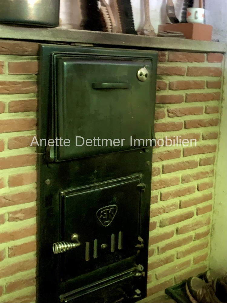 Ofenklappe im Nebenraum